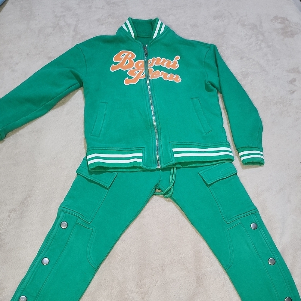 Green Tracksuit with Orange Logo